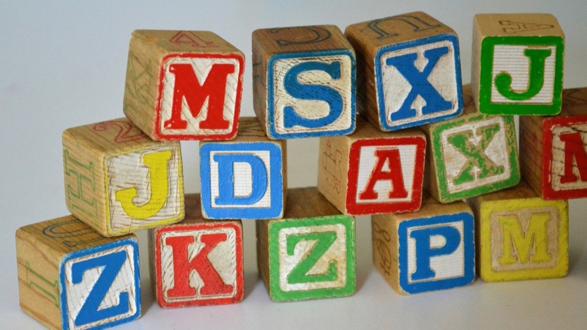 Alphabet learning blocks stacked on a table